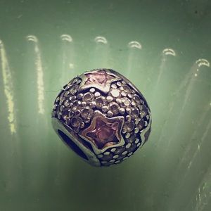 Pandora Follow the stars pink charm discontinued.